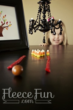 Bonus Craft Tutorial and free printable:  Candy Corn bowling! by  www.fleecefun.com 