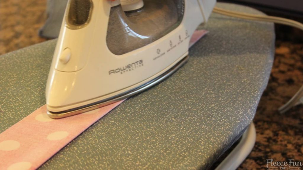 Handmade apron ties being sewn for a perfect fit using the fleecefun free template