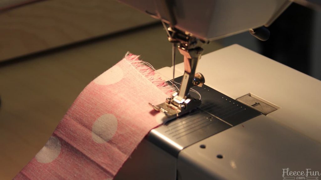 Stitching the straps for a secure child apron using the fleecefun tutorial