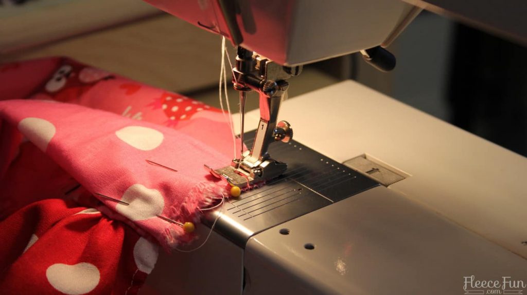 sewing the straps into place