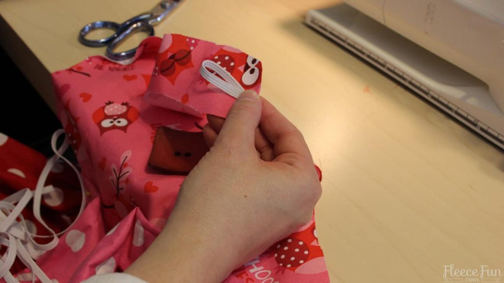 Stitching on the adjustable apron straps following the fleecefun free template