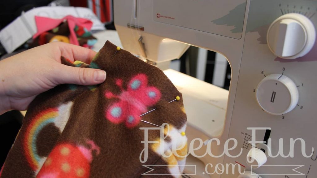 making the compartments.I love this sleeping bag pack that turns into a backpack! It's a free sewing pattern and there is a video to make it easy! This sleeping bag pack how to is a great DIY sewing project.