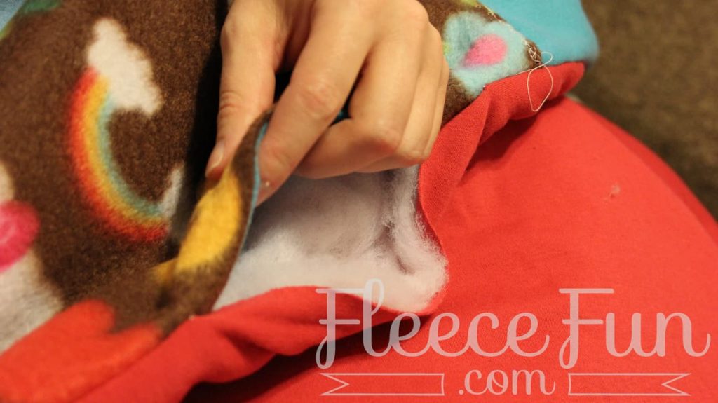 sewing the gap closed. I love this sleeping bag pack that turns into a backpack! It's a free sewing pattern and there is a video to make it easy! This sleeping bag pack how to is a great DIY sewing project.
