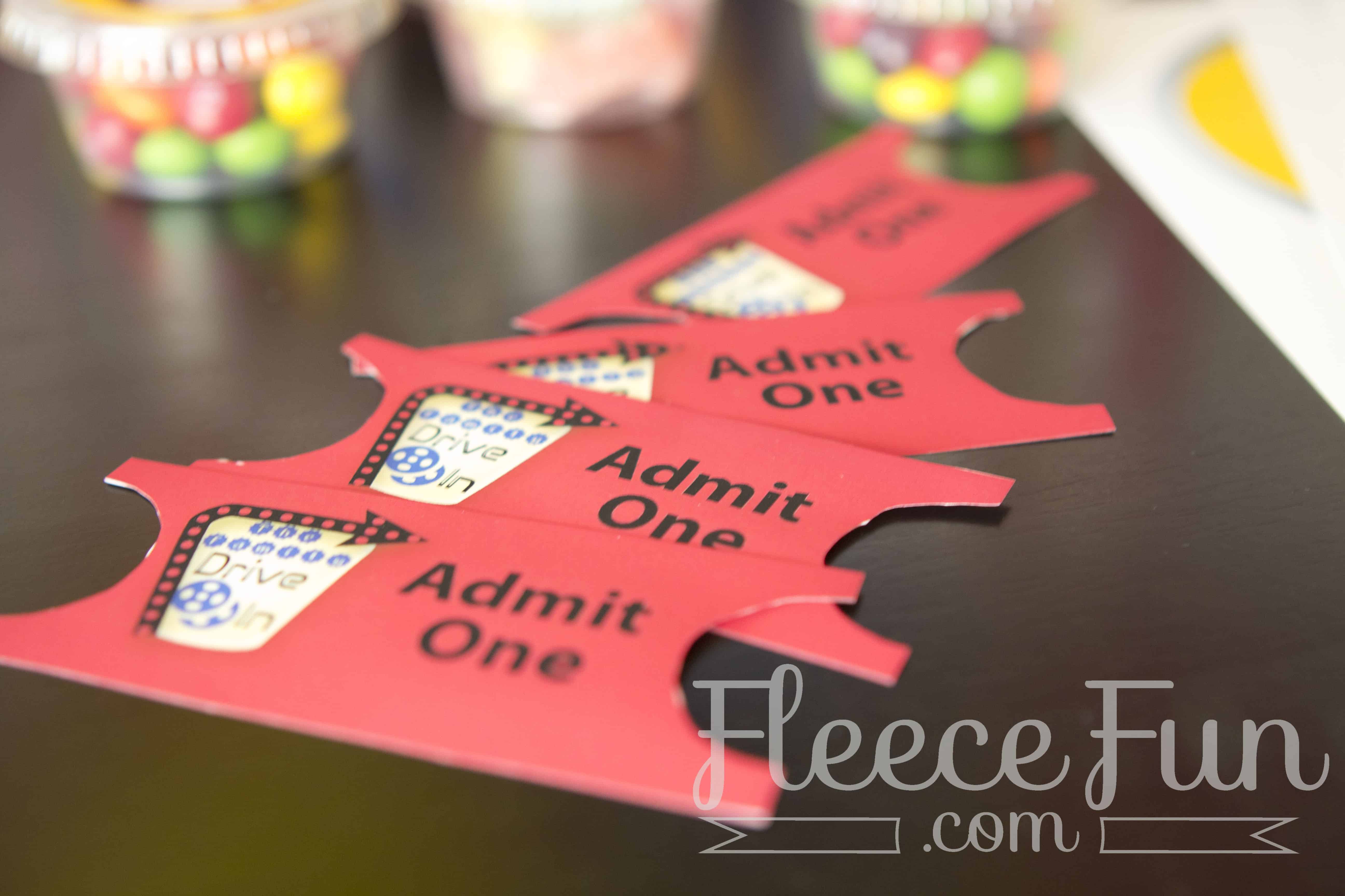 Punching out the tickets squares. Drive-In Theater Large Punches and Tickets Free Printable, perfect for movie nights, themed parties, and fun family events, made with free printable and step-by-step tutorials from fleece fun