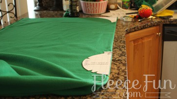 Placing the negative cut out of the cape.
