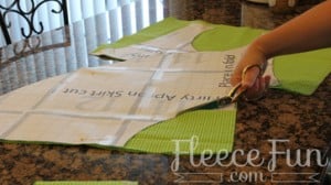 Laying out and cutting fabric for a DIY apron sewing project