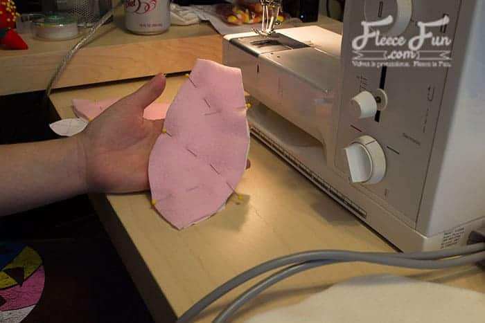 Pinning and sewing the bunny ears to the fleece hat pattern