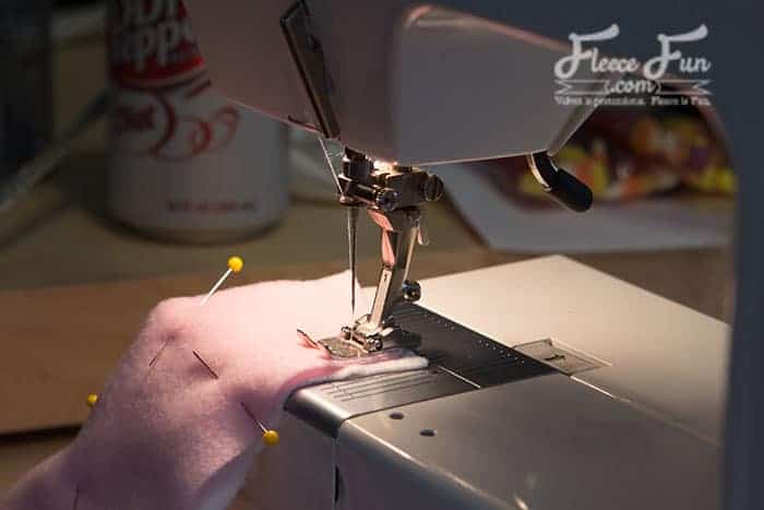 Attaching bunny ears to fleece hat with sewing tutorial from fleecefun