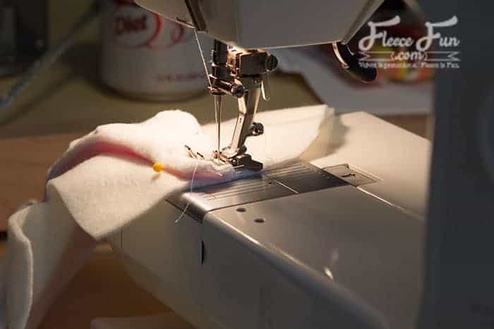 Using a 1/2 inch seam allowance, sew each side of the hat (the long curved side to the point before it dips into a “V”
