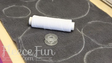 Prepping to sew. Made with just a few simple steps, this cozy bubble fleece scarf is soft, squishy, and totally different from anything in your closet. Whether you're braving chilly mornings or just want something cute to throw on, this DIY will leave you feeling wrapped in a cloud.