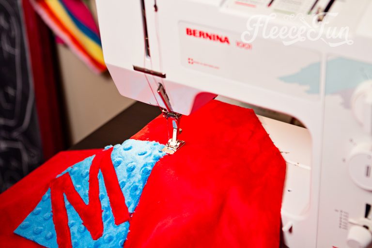 Applique with minky fabtric on a sewing machine. Minky feels wonderful but it can be a beast to sew with. These 7 tips for sewing with minky fabric to have success with your sewing project.