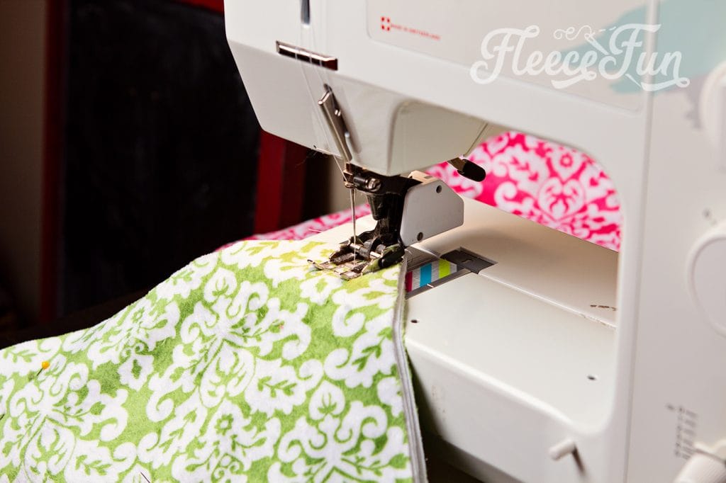 Using a walking foot on Minky Fabric. Minky feels wonderful but it can be a beast to sew with. These 7 tips for sewing with minky fabric to have success with your sewing project.