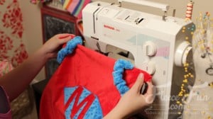 attaching the straps to the cape