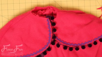 prepping the back of the cape. You can make a cape that is inspired by Princess Anna's cape form Disney's Frozen . This DIY costume idea is perfect for your little Disney Princess. The video makes it easy to sew.