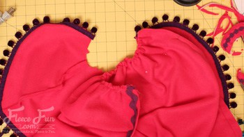 basting down the back of the cape. You can make a cape that is inspired by Princess Anna's cape form Disney's Frozen . This DIY costume idea is perfect for your little Disney Princess. The video makes it easy to sew.