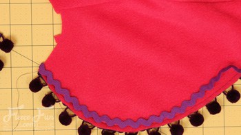 adding pompoms. You can make a cape that is inspired by Princess Anna's cape form Disney's Frozen . This DIY costume idea is perfect for your little Disney Princess. The video makes it easy to sew.