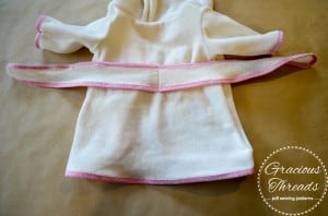 Finishing the doll robe. This Doll Robe free pattern fits American Girl® and other 18″ dolls perfectly, making it a sweet gift or stocking stuffer. The step-by-step tutorial walks you through the whole process in just six easy steps, so even if you’re short on time, you can still make something adorable.