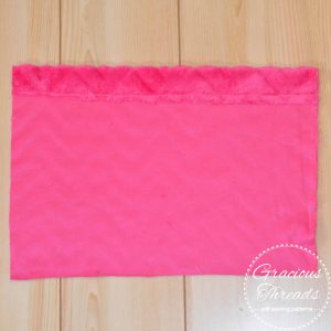 Hemming fleece rectangle edges for a neat Valentine's pillow with fleecefun guidance