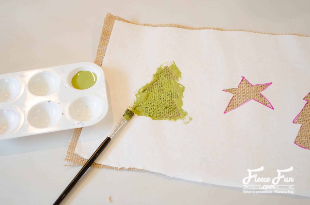 Ironing and painting the design.