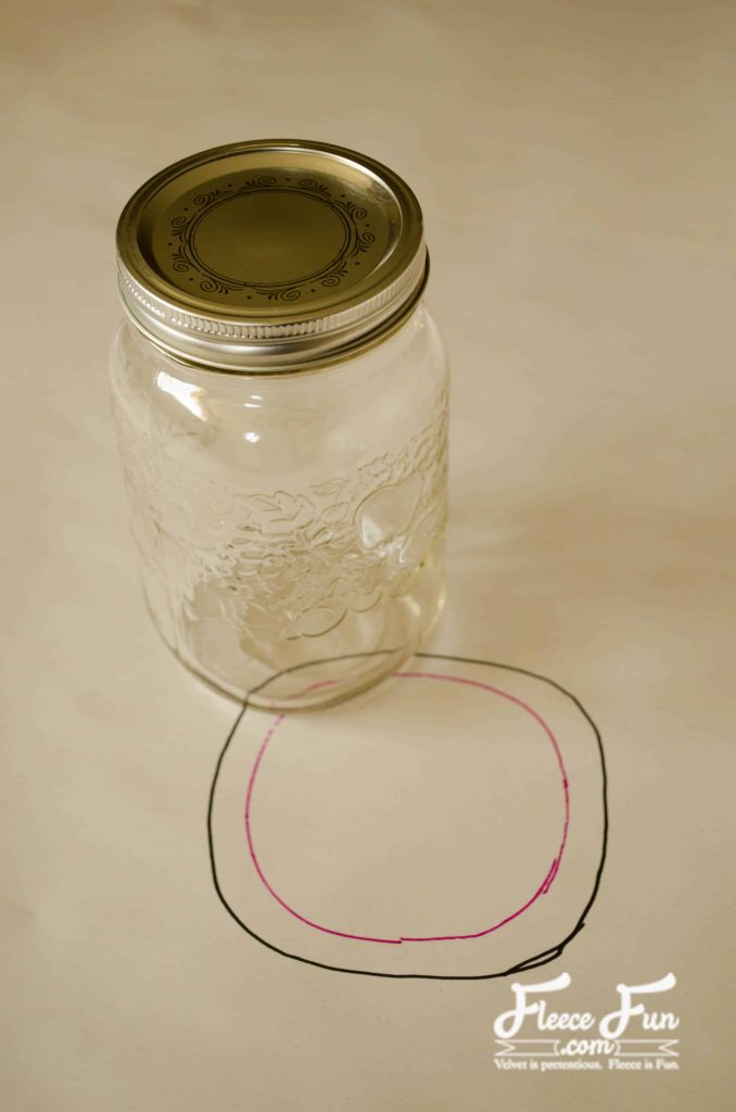 Tracing the jar base. Gifting just got a glow-up. With this simple mason jar cover tutorial, you can turn any treat, mix, or cocoa into a thoughtful handmade gift. It’s all about the details—and this burlap wrap adds that cozy, homespun charm everyone loves. Follow the free tutorial and wrap your jars in something special this holiday.