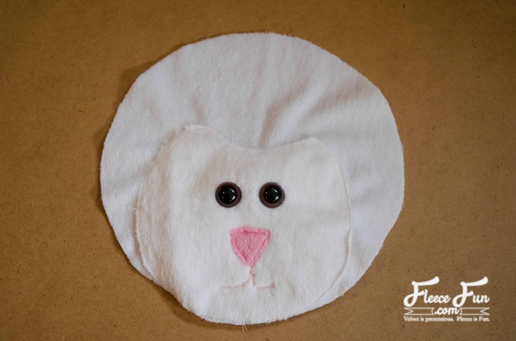 attaching safety eyes. I love this fleecy sheep purse pattern and tutorial. Such a great handmade gift DIY idea and perfect sewing for a little girl.