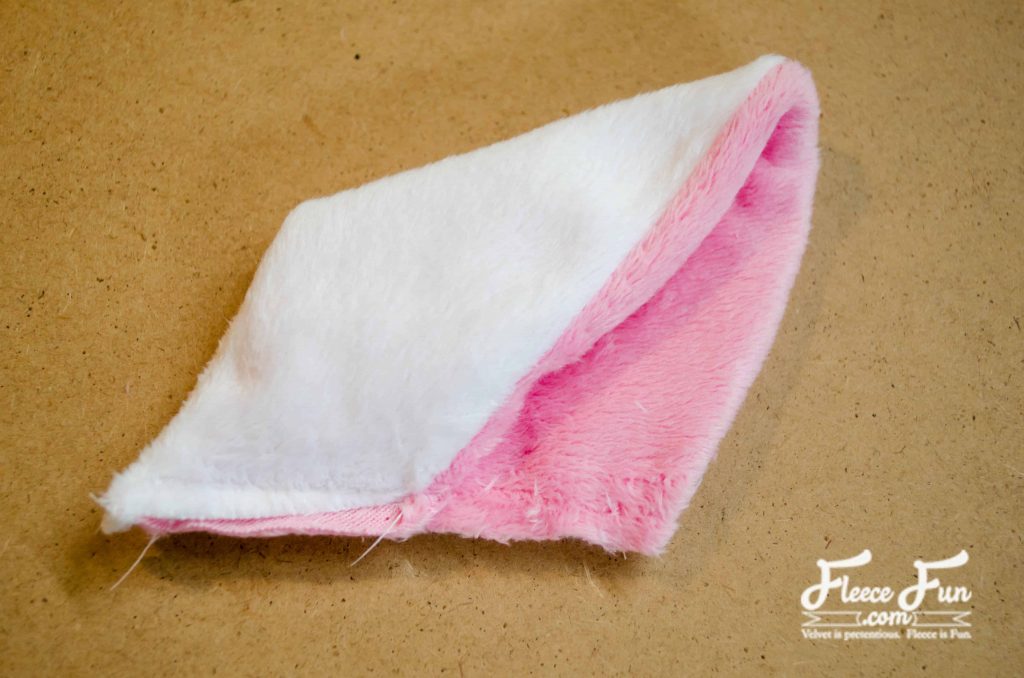 finishing the ears. I love this fleecy sheep purse pattern and tutorial. Such a great handmade gift DIY idea and perfect sewing for a little girl.