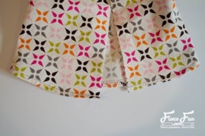 Stitching the hem of the 18-inch doll tunic for a professional look using fleecefun free template and tutorial