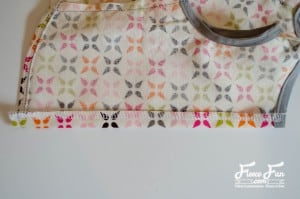 Stitching the final details on the tunic’s back edge with fleecefun free template and tutorial