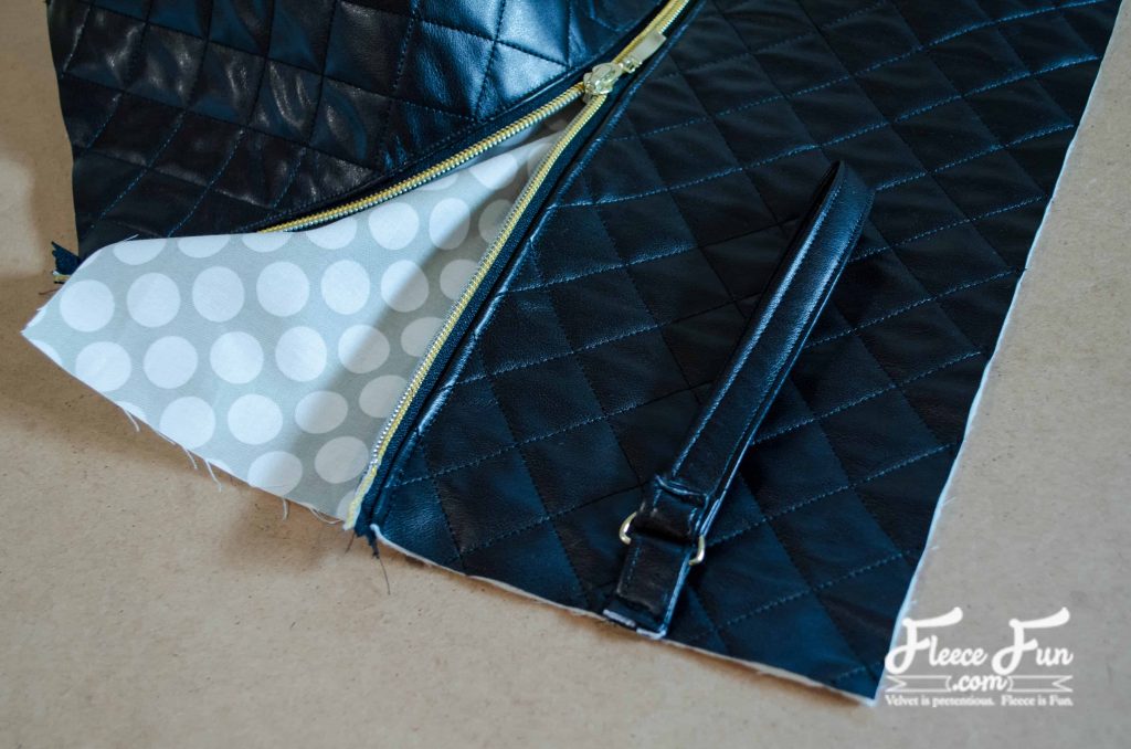 opening the zipper. Love this Quilted Leather Clutch Tutorial! it looks simple to make and so chic! I want to sew this.