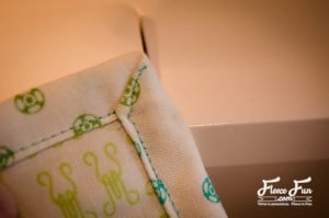 sewing along the angle.I love this Craft room hanging organizer. The sewing instructions are clear and easy to follow. I think I will make it in the colors to go with my sewing space. Great DIY.