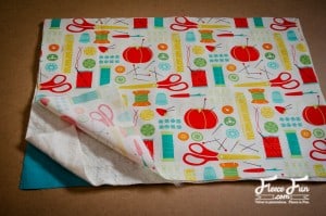 cutting and layering the fabrics. I love this Craft room hanging organizer. The sewing instructions are clear and easy to follow. I think I will make it in the colors to go with my sewing space. Great DIY.