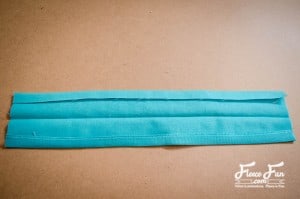 cutting the top strip. I love this Craft room hanging organizer. The sewing instructions are clear and easy to follow. I think I will make it in the colors to go with my sewing space. Great DIY.