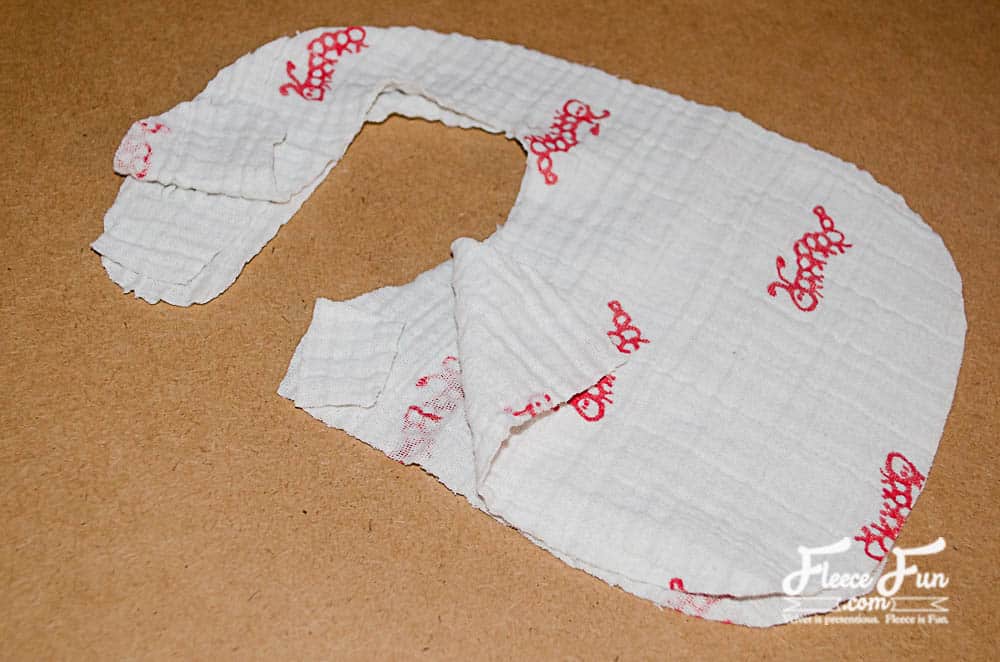 Two of the free muslin bib pattern cut out and ready for sewing.