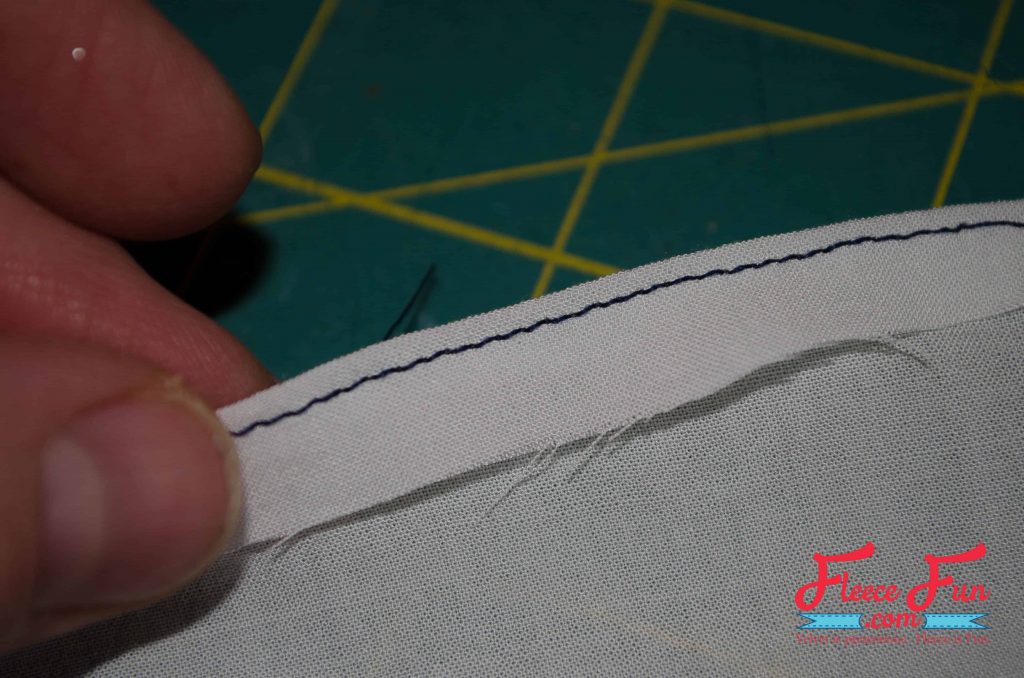 Stitch the hem very close to the fold.