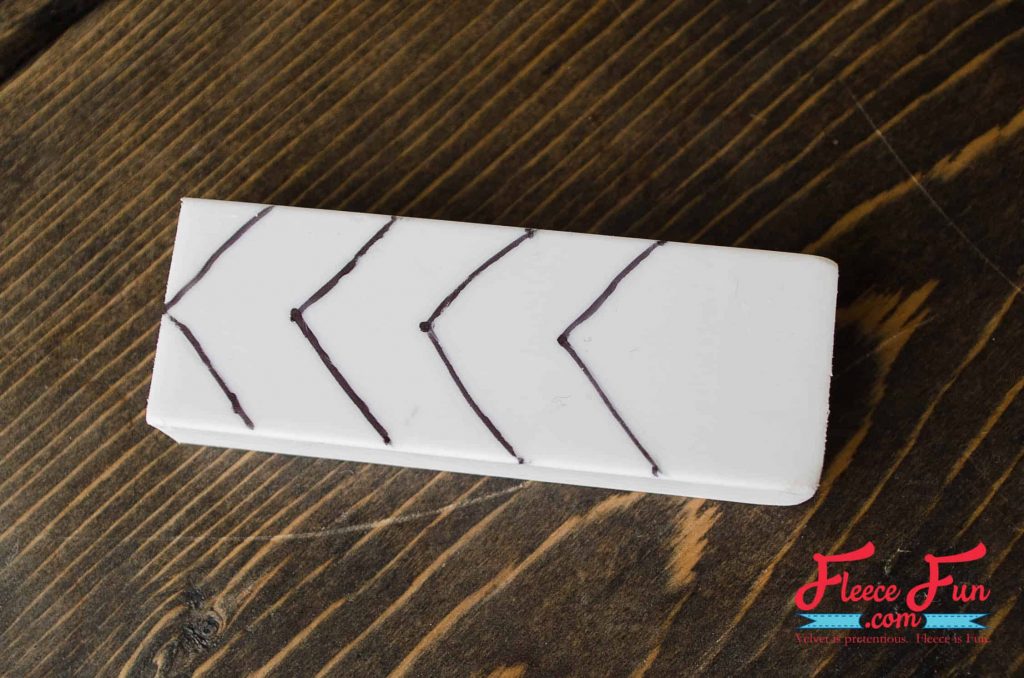Designing your stamp and draw it in your eraser.