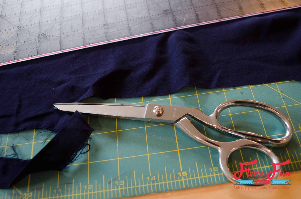 Trimming the raw edges to look clean. This hand stamped scarf tutorial shows you how to turn a blank scarf into a statement piece—no fancy tools needed. With just a stamp, some paint, and a little time, you’ll end up with a one-of-a-kind accessory that’s uniquely you. It’s simple, fun, and makes the perfect handmade gift.