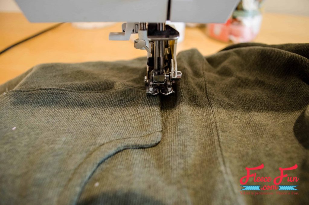 Topstitch pocket in place along all the straight edges. Make an upcycled skirt with fleecefun's free pattern and tutorial