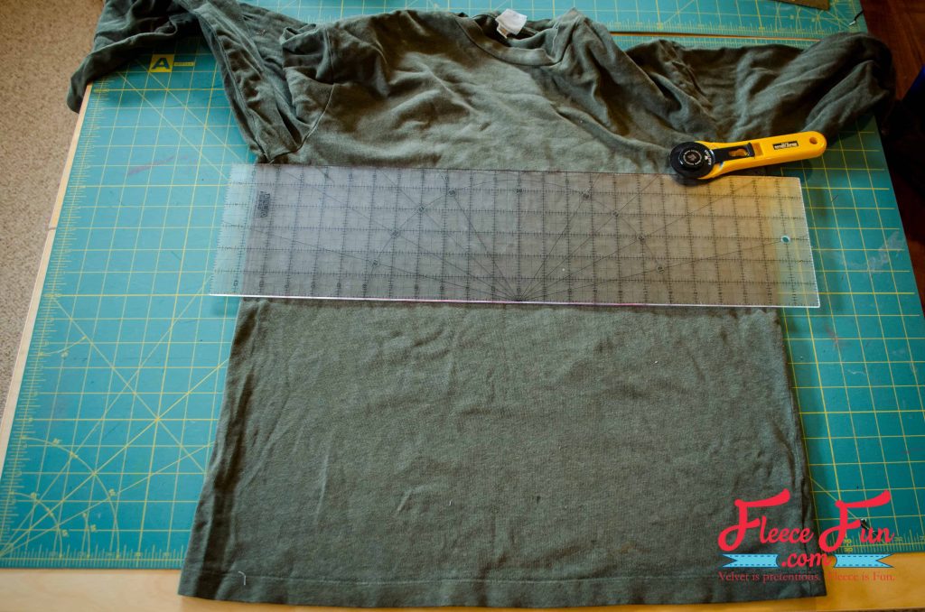 Step 1 of upcycled sweater skirt: cutting out pieces with free fleecefun template