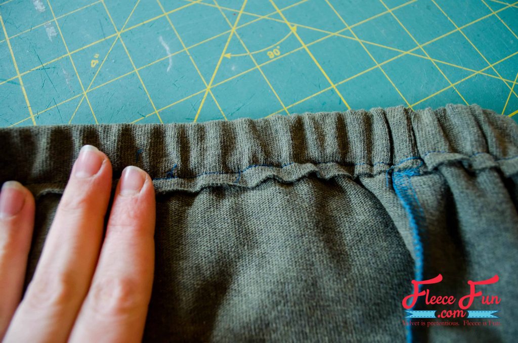Sew casing opening shut, matching up with previous stitching lines. Upcycled sweater skirt tutorial and free template by fleecefun