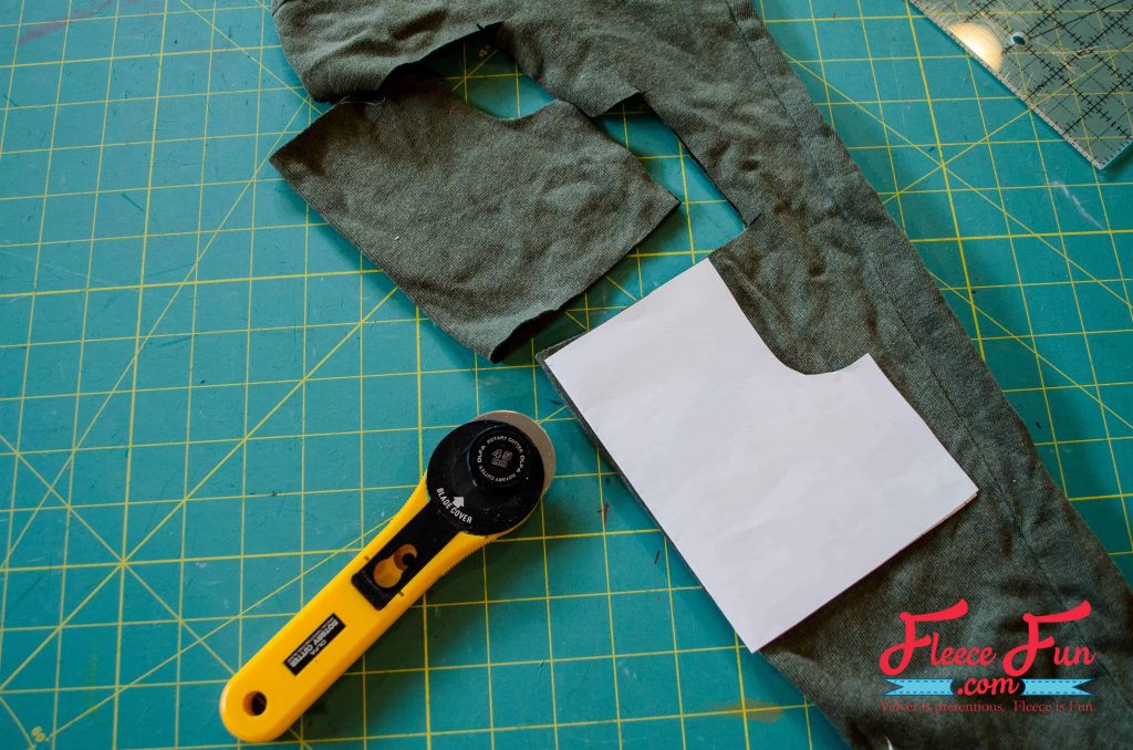 Cut out two pocket pieces on the fold from one of the sleeves.