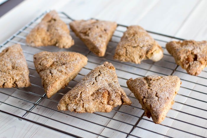Cooling on a rack. Enjoy Cinnamon Apple Scones with this free recipe, a cozy autumn treat perfect for breakfast, brunch, or sharing warm with friends.