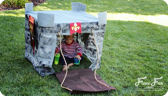 Wow I love this play castle tutorial. Such a great DIY idea for play for kids. Love how it fits onto a card table and folds into a bag when play is done!