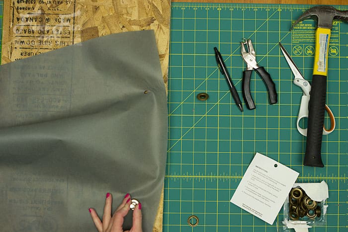 making the bag top for the play castle. Wow I love this play castle tutorial. Such a great DIY idea for play for kids. Love how it fits onto a card table and folds into a bag when play is done!