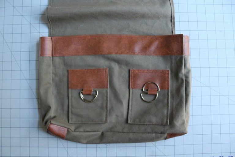 finished trim. I love this How to make a Man Satchel DIY tutorial. It's the perfect handmade gift idea for this guy I know. I love all the faux leather trim too. Great clear DIY step by step sewing tutorial.