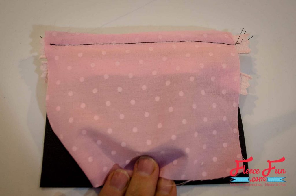 Aligning and stitching the zipper for a professional finish using fleecefun’s free guide
