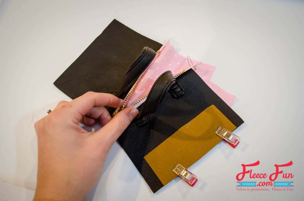 Adding the final lining to the handmade leather fringe purse with fleecefun’s free pattern