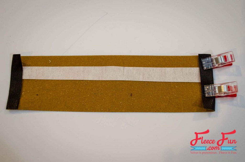 Folding over the ends of the strap