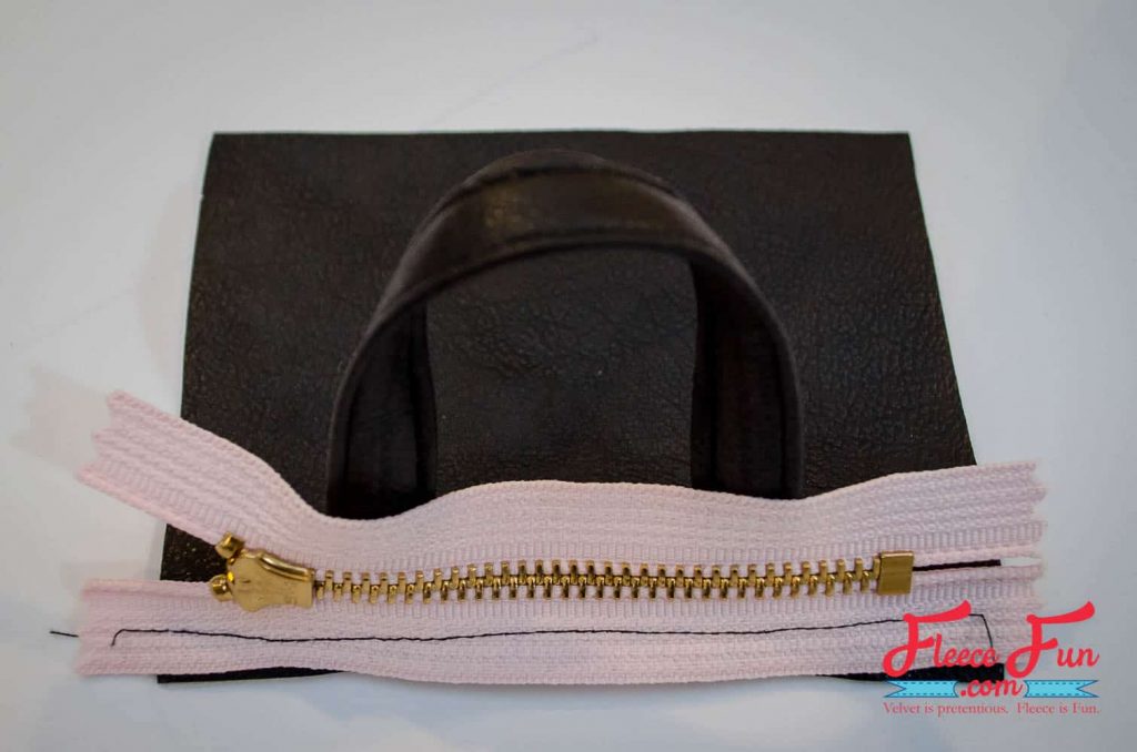 Stitching the zipper teeth