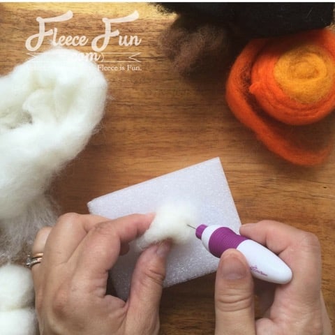 Snowman ornament body assembly in progress using fleecefun and free tutorial