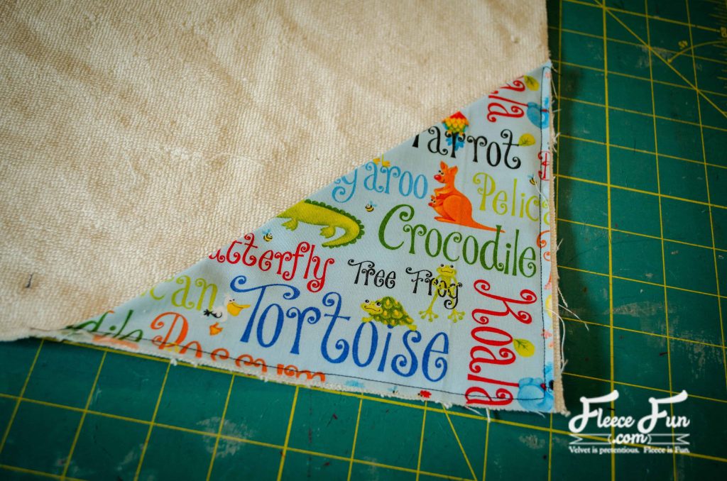 making the corner pocket.I love this sewing project for babies. This diaper changing mat is simple to make and the perfect addition to any diaper bag or purse! fleece fun waterproof change mat tutorial